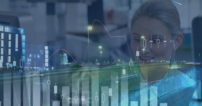 Statistical data processing over caucasian woman working at office against night city traffic