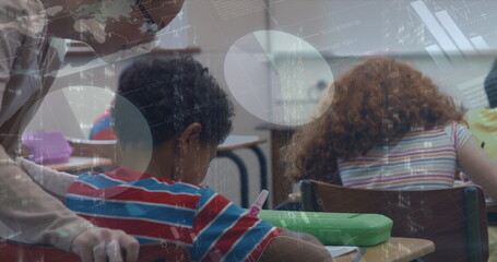 Obraz premium Statistical data processing over caucasian female teacher teaching a african american boy at school
