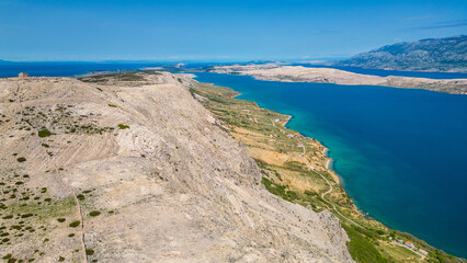 Aerial photo of the remains of the Church of St. Vitus (Sveti Vid) on Pag Island, Croatia. Set on a scenic hilltop with panoramic views of the island’s rocky landscape and coastline. Captured by drone