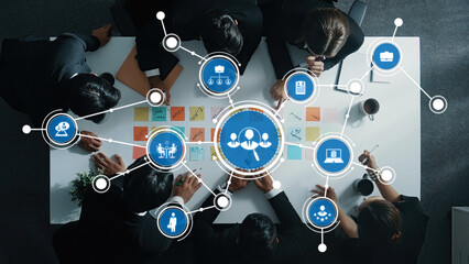 Top down aerial view of manager discuss and choose marketing idea from sticky notes. Group of...