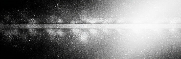 captivating black and white gradient background featuring grainy texture, evoking sense of depth and mystery. interplay of light and shadow creates striking visual effect