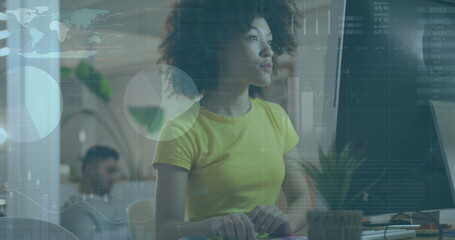 Image of data processing over biracial businesswoman in office