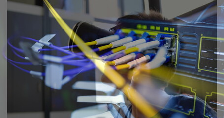 Image of server room over caucasian boy using vr headset