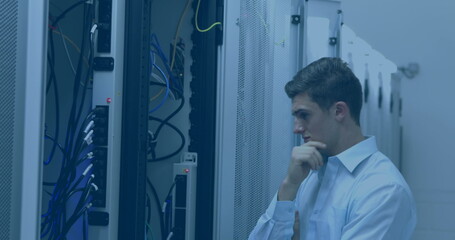 Image of shapes over caucasian male worker inspecting server room