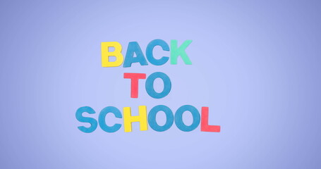 Image of back to school text over blue background