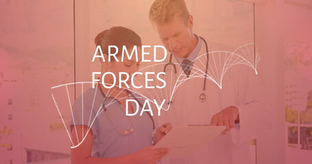 Image of armed forces day over caucasian female and male doctors talking
