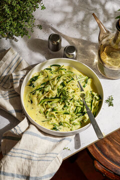 Creamy garlic zucchini noodles (zoodles) served as a healthy low-carb pasta alternative