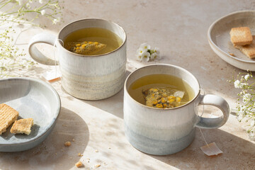 Chamomile Tea and Biscuits. Made from tea bags in a mug.