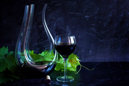 Decanting red wine concept with swan style decanter that is suitable for bold wine such as shiraz cabernet shown.