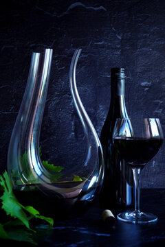 Decanting red wine concept with swan style decanter that is suitable for bold wine such as shiraz cabernet shown.