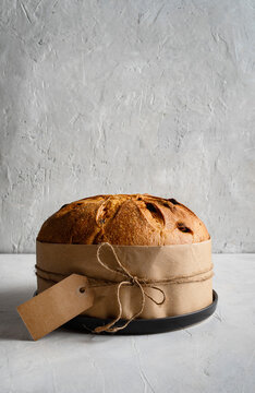Traditional panettone, with a perfect golden crust. An icon of Italian culinary traditions for the holidays