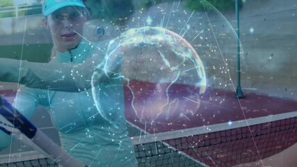 female tennis player swinging racket on clay court, showcasing tech with digital globe overlay - Powered by Adobe
