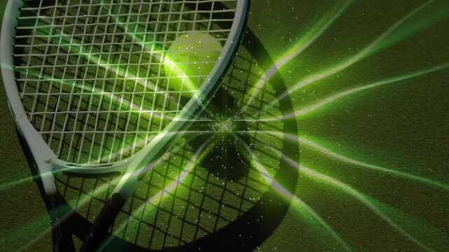 Tennis racket and tennis ball being displayed on green court radiating trails and white sparkles