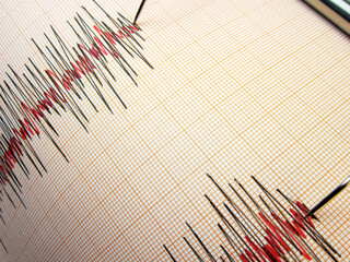              Seismograph and earthquake. A seismograph that records the seismic activity of an earthquake.                                                 