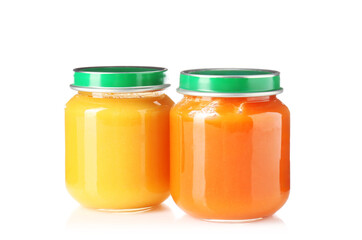 Baby food. Tasty puree in glass jars isolated on white