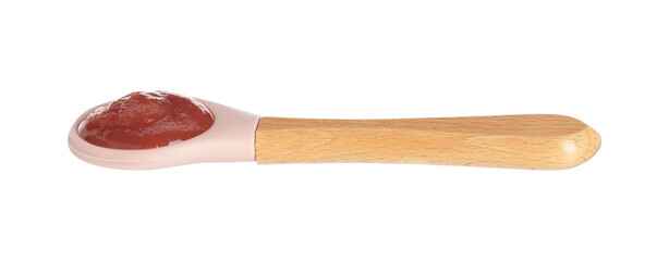Baby food. Spoon with tasty puree in air on white background