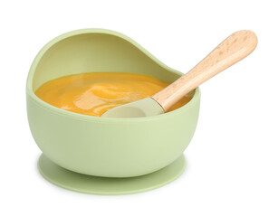 Baby food. Tasty puree in bowl and spoon isolated on white