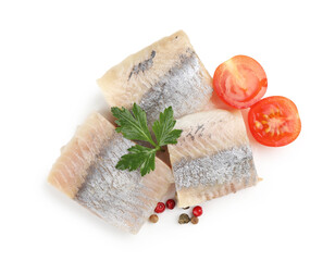 Pieces of delicious herring with parsley, tomatoes and peppercorns isolated on white, top view