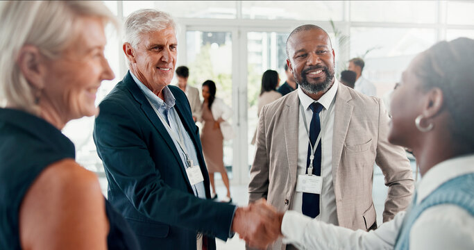 Conference, handshake and welcome with business people at event for global forum, investor summit and networking. Shaking hands, b2b convention and expo with employees for brand exposure seminar