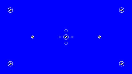 Blue screen template with tracking marks. Chromakey technique. Studio background.