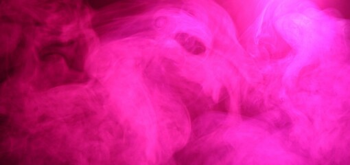 Fototapeta premium Beautiful smoke in pink light on dark background