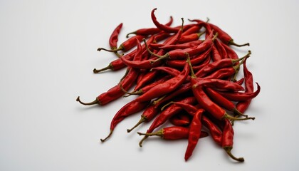 Vibrant Red Chili Peppers Piled on a White Background