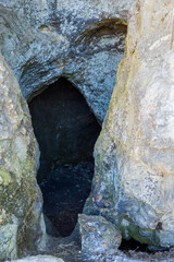 A small cave in a rocky area