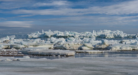 Obraz premium Russia. The western coast of Sakhalin Island. The picturesque last ice in the spring Sea of Okhotsk.