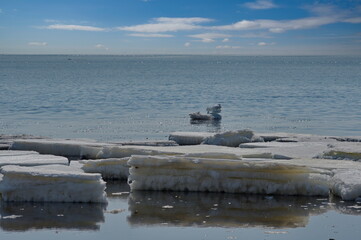 Russia. The western coast of Sakhalin Island. The picturesque last ice in the spring Sea of Okhotsk.