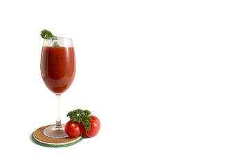 One glass with freshly squeezed tomato juice stands on a white background.
