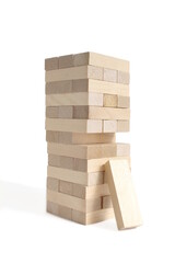 There is a tower of wooden blocks on a white background.