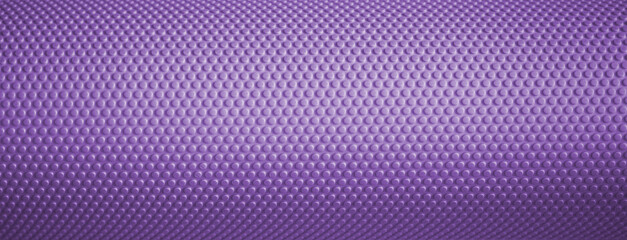 Purple yoga mat textured surface showing dot pattern