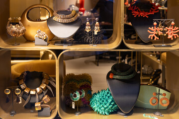 Venice, Italy - April 20 2025: Contemporary jewelry displayed in luxury boutique window in central...