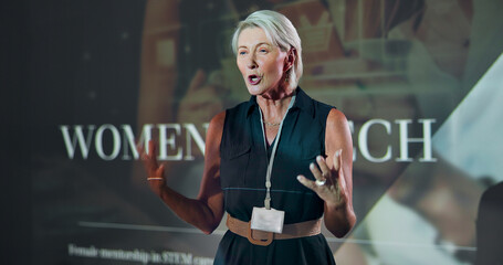 Business, speech and woman at seminar for motivation at tech conference. Convention, presentation and keynote speaker at event for training, coaching and advice for inspiration with mature programmer