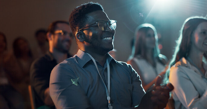 Applause, night and business man at conference for tech seminar, app success and quantum computing technology. Innovation, achievement and workshop panel with people or audience at expo for ai forum