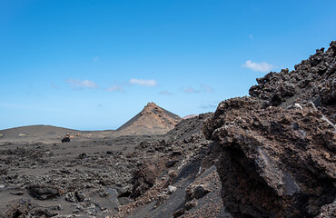 Landscape photography of mountain and desert with volcanic stones, Timanfaya National Park,...