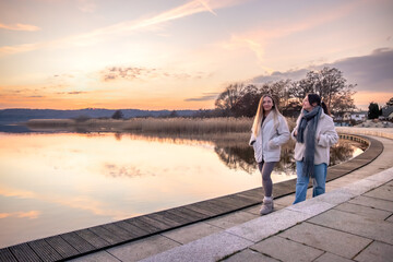 Walk along the promenade. A walk by the sea. Walking in nature. Sunset.