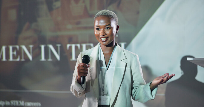 Business, speech and black woman at conference for motivation at tech seminar with mic. Convention, presentation and keynote speaker at event for story, advice and inspiration with happy programmer - Powered by Adobe