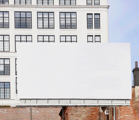 Blank billboard in downtown urban setting. 