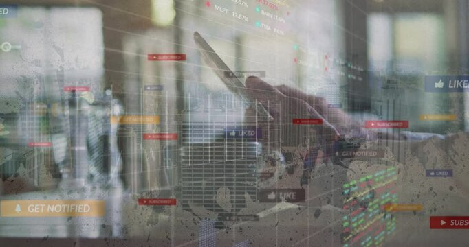 Office worker hand tapping tablet in office showing subscription buttons and financial graphs