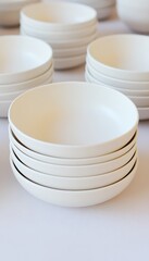 A serene stack of bowls showcasing delicate porcelain simplicity in a minimalist