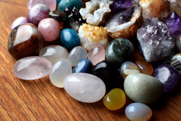 Beautiful natural semi-precious stones lie on a dark background. Predictions, witchcraft, spiritual...