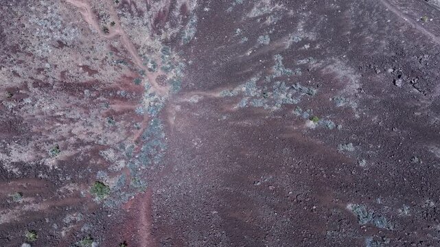Aerial volcano cinder cone mountain St George Utah above. Southwestern desert. Volcano cinder cone mountains in desert landscape. Geological landscape wind, weather and water carved erosion.