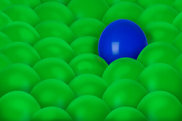Blue balloon among green ones. Different, unique, special