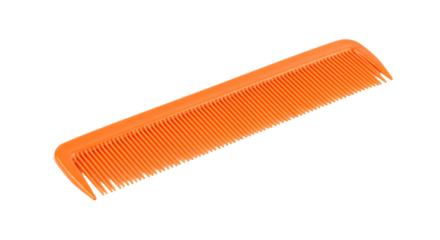 A single orange plastic comb with fine teeth lying diagonally on a plain black background surface view