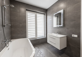 Modern Home Bathroom Interior With Minimalistic Design and Dark Gray Tile Finish