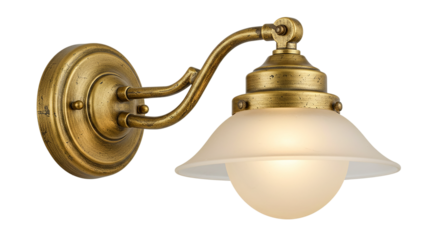 Illuminated vintage brass wall sconce with frosted glass shade against a dark black background space