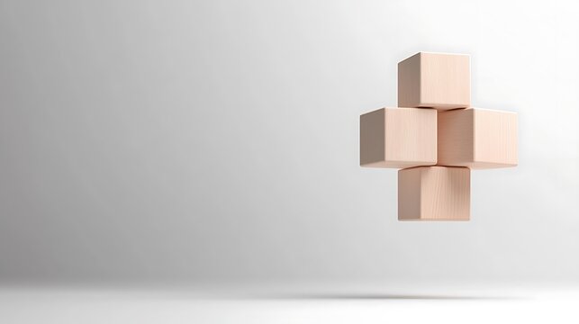 Fototapeta Beige Wooden Cubes Interlocking in a Plus Shape on Light Background