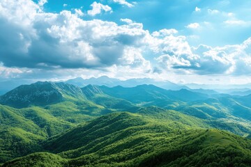 Fototapeta premium A vast vista of verdant mountains under a vibrant sky filled with fluffy clouds.