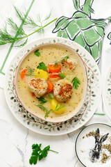 Vegetable soup with young cabbage and meatballs. style hugge